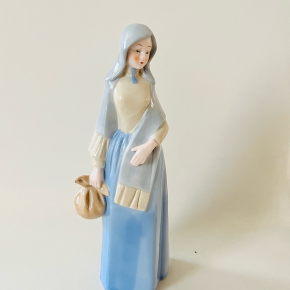 Porcelain Figurine in Blue and Cream